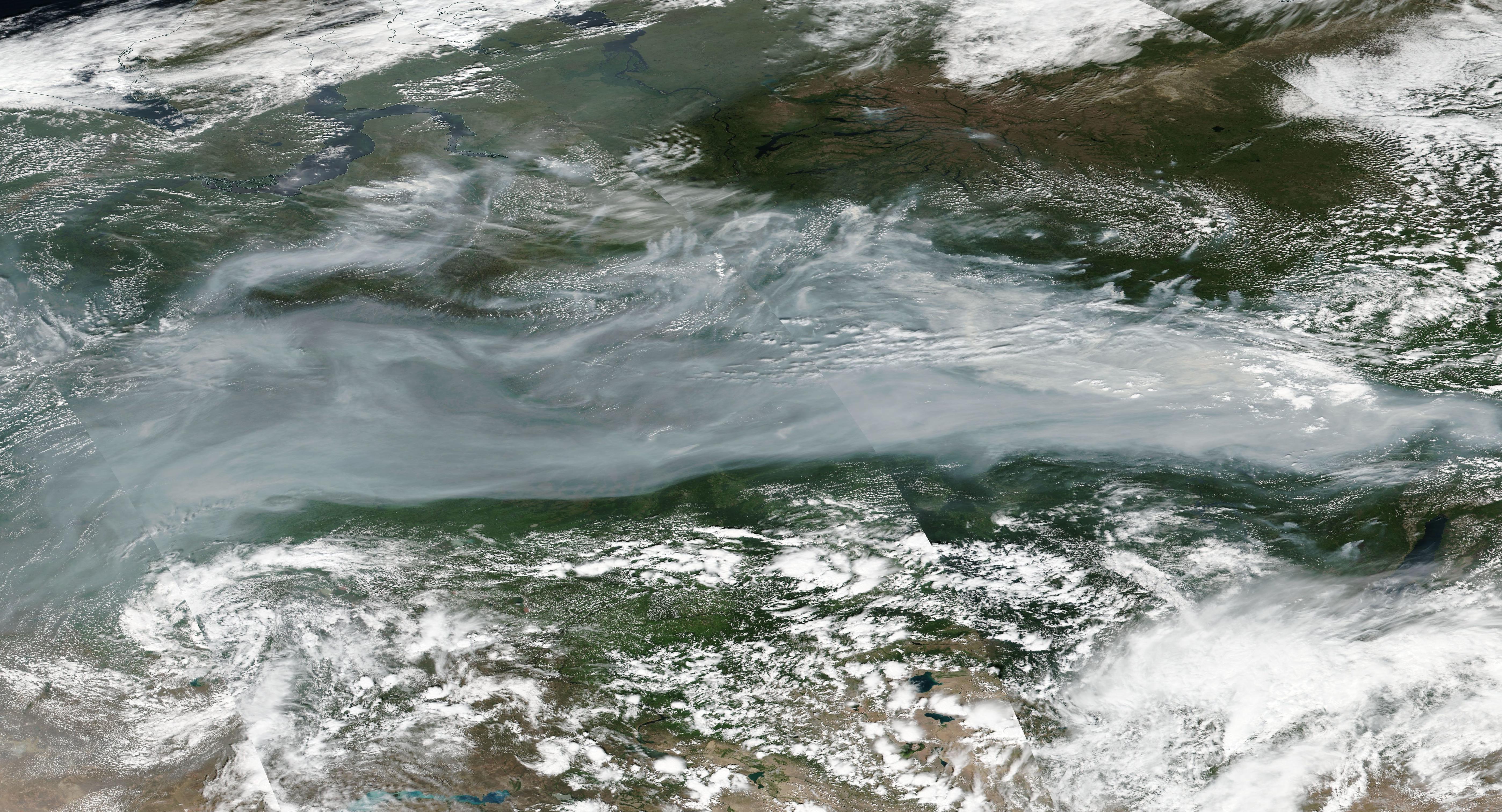 A blanket of smoke from fires in Siberia is so huge it can be seen from nearly 1 million miles away in space